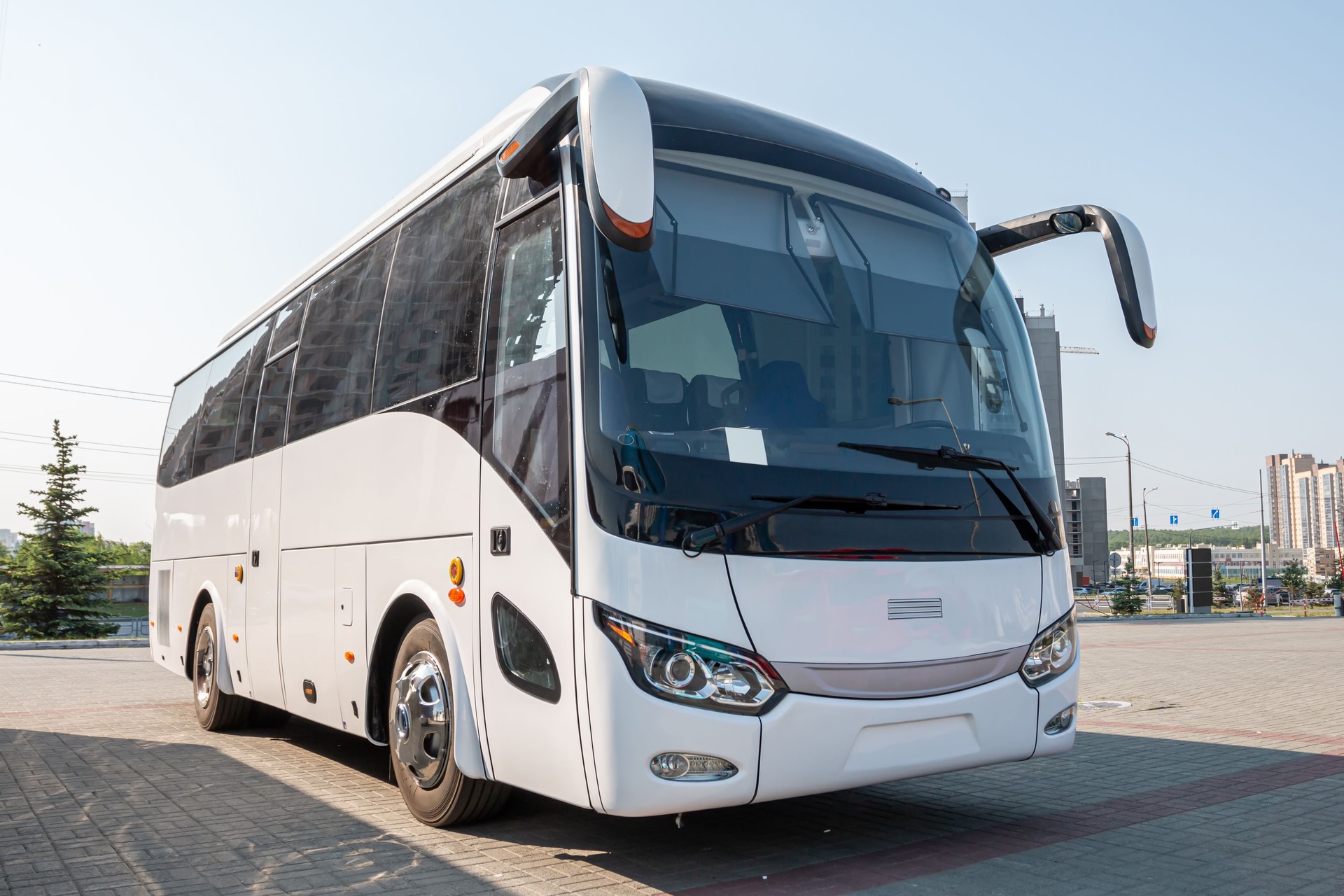 White intercity bus in the parking lot